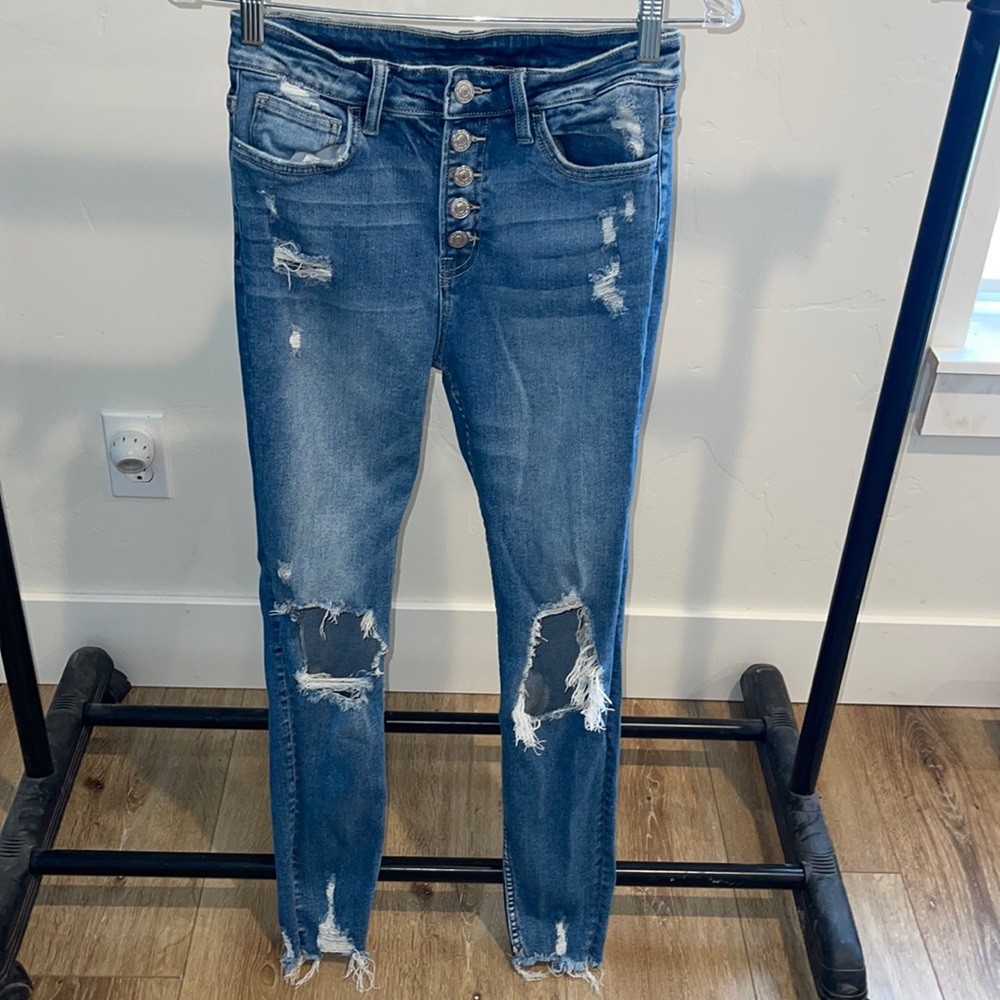 Distressed flying monkey jeans